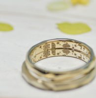観覧車やクルーズの思い出の風景を彫刻した結婚指輪